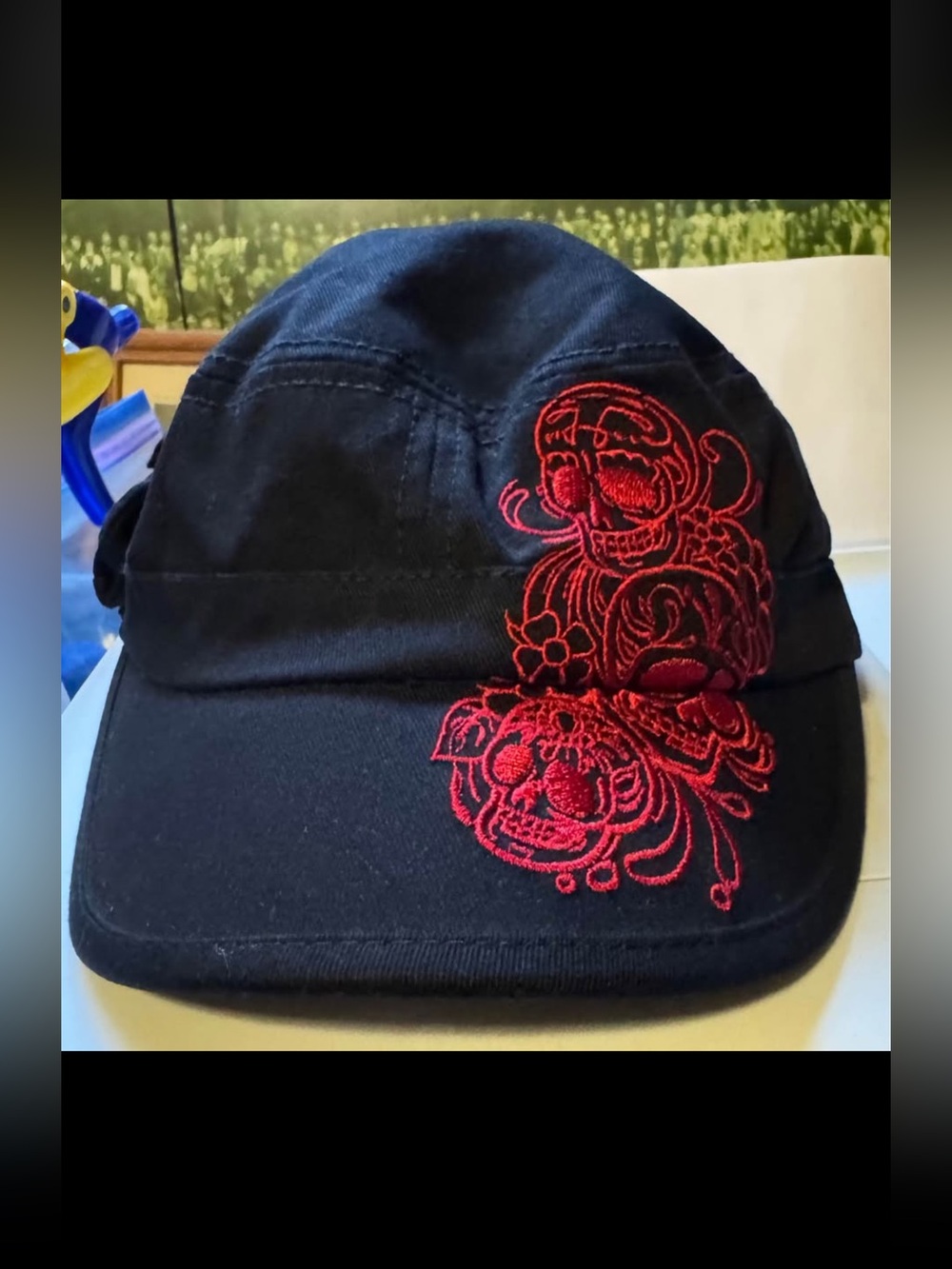 Women’s Hot Leathers BeautifulBlack Cap with Red Embroidered Floral Skull Accent